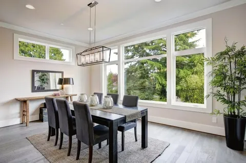Bright dining room featuring large custom replacement windows installed by Zion Windows in Columbus, OH