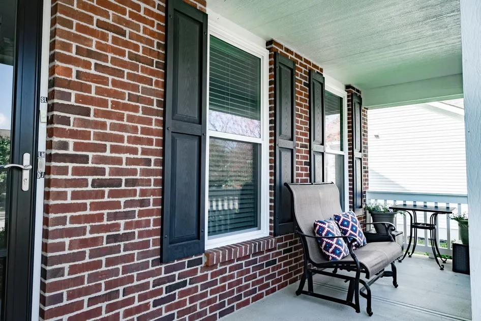 Custom casement windows installed in a Columbus OH living room open to 90 degrees for maximum airflow.